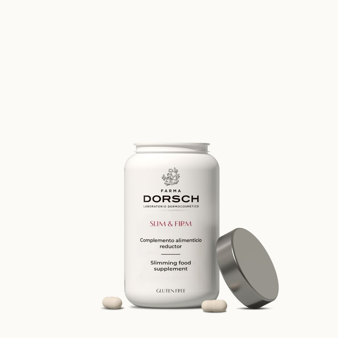 Envase abierto del complemento alimenticio Slim & Firm de Farma Dorsch, con cápsulas visibles sobre fondo claro.