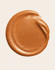 Textura de BODY BRONZING de FARMA DORSCH, crema corporal con color de acabado natural y fácil aplicación.