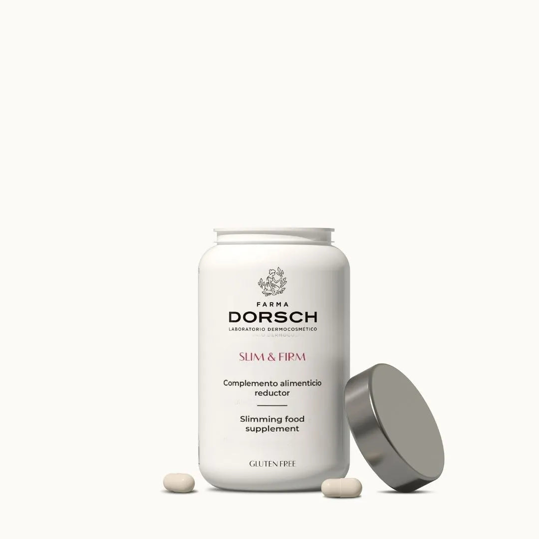 Envase abierto del complemento alimenticio Slim &amp; Firm de Farma Dorsch, con cápsulas visibles sobre fondo claro.