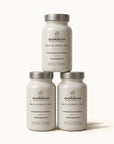 tres frascos de ORAL SUN PROTECTION de FARMA DORSCH, colocados en piramide, fotoprotector oral de nutricosmética.
