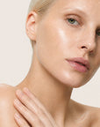 Piel más suave, luminosa y uniforme tras usar DERMO PEEL de FARMA DORSCH en la rutina corporal.